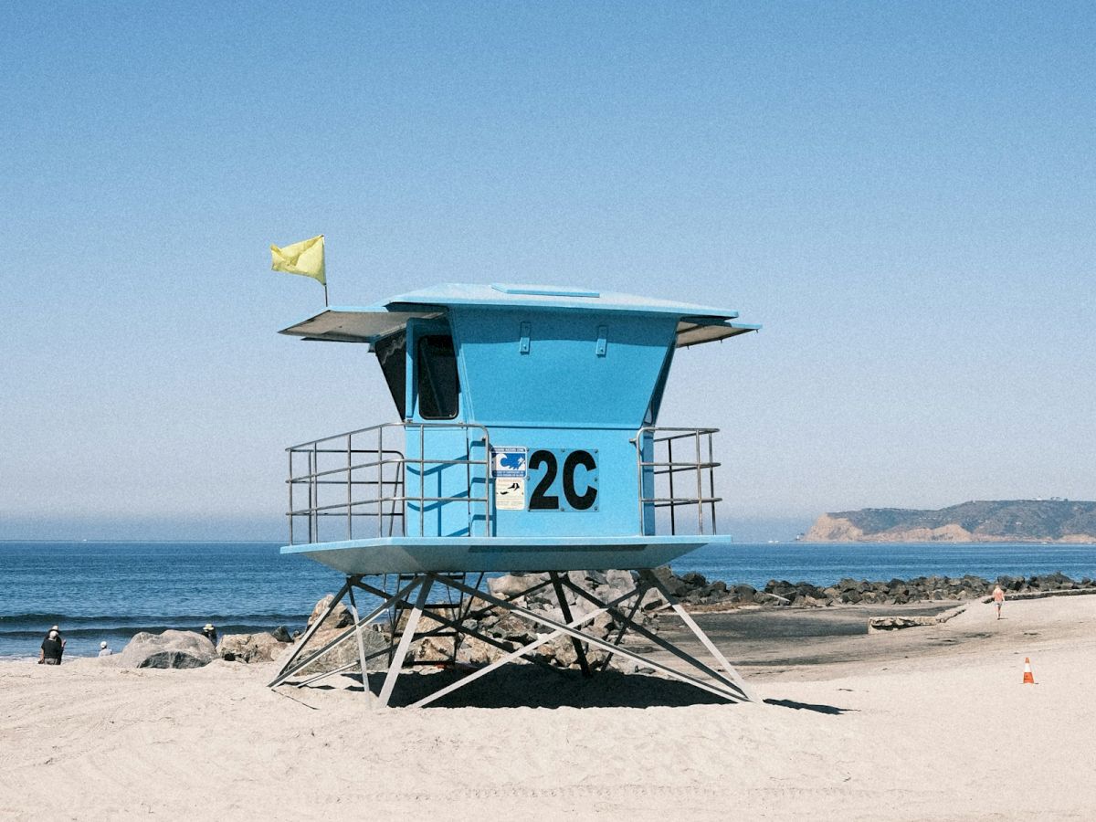 Blue lifeguard tower on the white sand of Coronado Beach